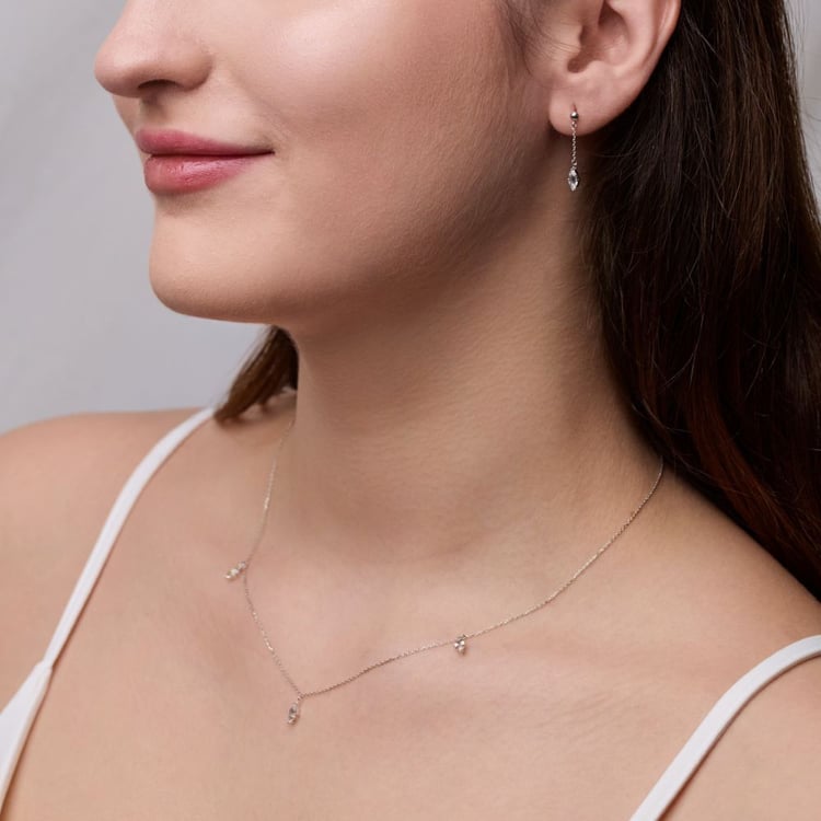 Zlatá kolekce šperků s bílými topazy 164075