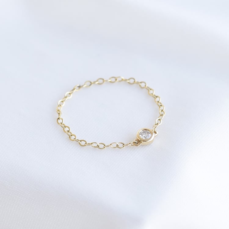 Prsten s diamantem ze žlutého zlata 93354