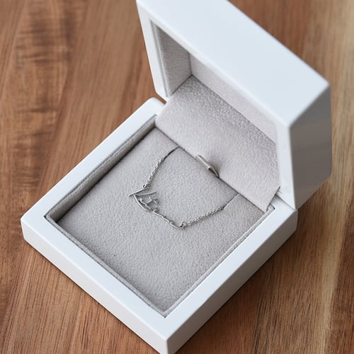 Zlatý náhrdelník se jménem a diamantem Dovev