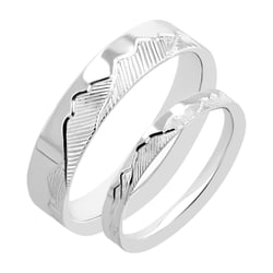 Platinové snubní prsteny s ruční rytinou hor Safa