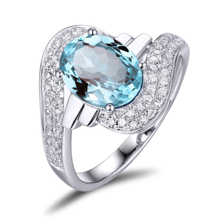 Zlatý prsten s oválným akvamarínem a diamanty Dalex