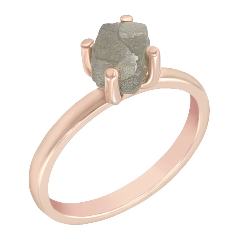 Nebroušený diamant ve zlatém prstenu