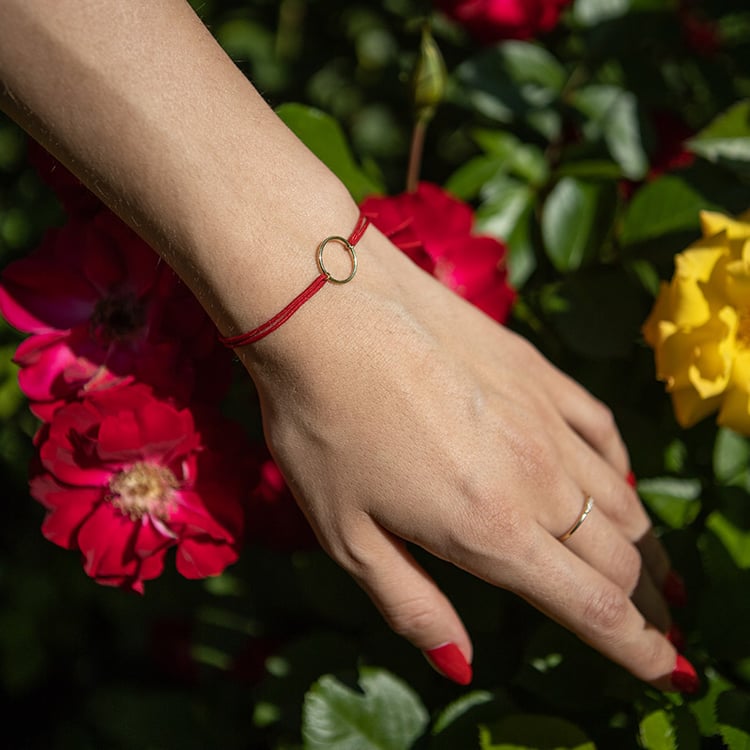 Stříbrný šňůrkový náramek se symbolem Karma 108767