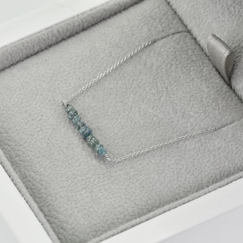 Zlatý náramek s modrými nebroušenými diamanty Wiul