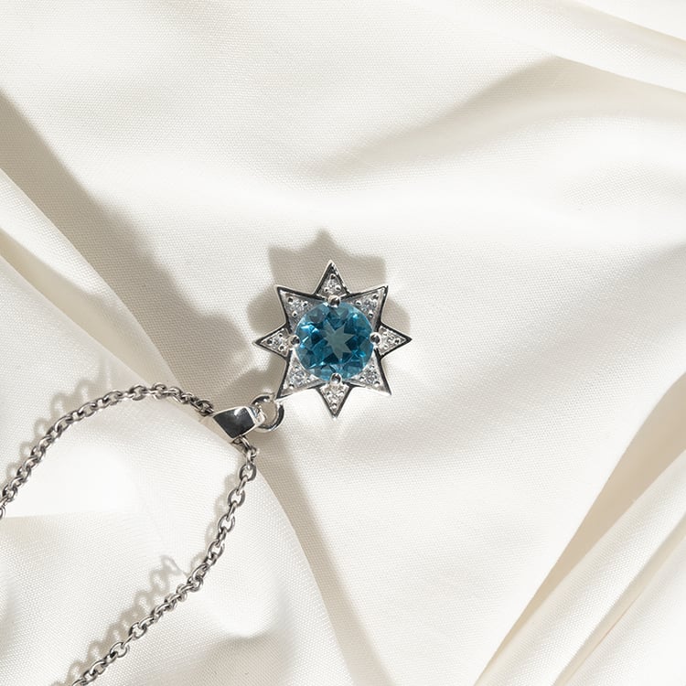 Stříbrný přívěsek s topazem a zirkony ve tvaru hvězdy Bohemia 135143