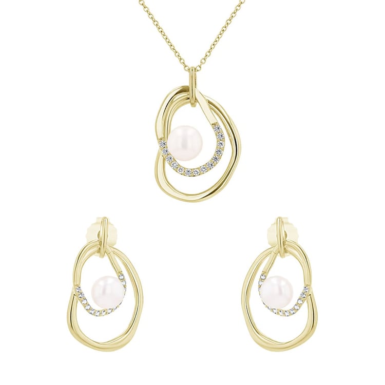 Kolekce stříbrných šperků s perlami a bílými topazy