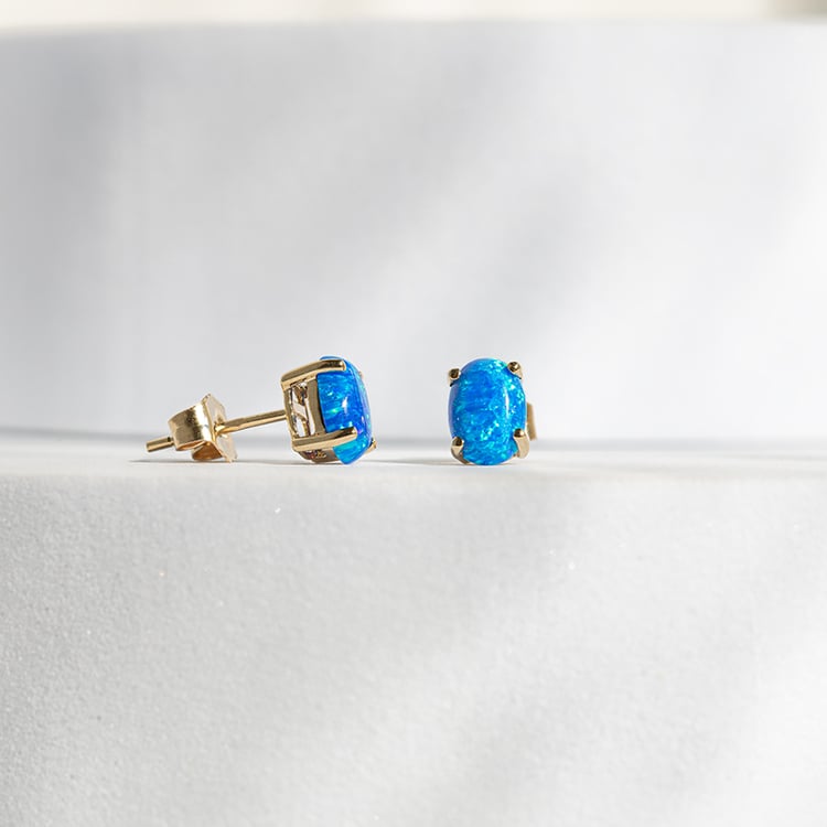 Modré oválné opály ve zlatých náušnicích Qati 145534