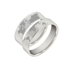 Snubní prsteny ze zlata s gravírem zeměkoule a diamantem Zeoni