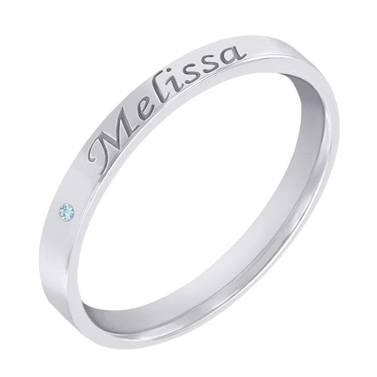 Zlatý prsten s drahokamem a gravírem