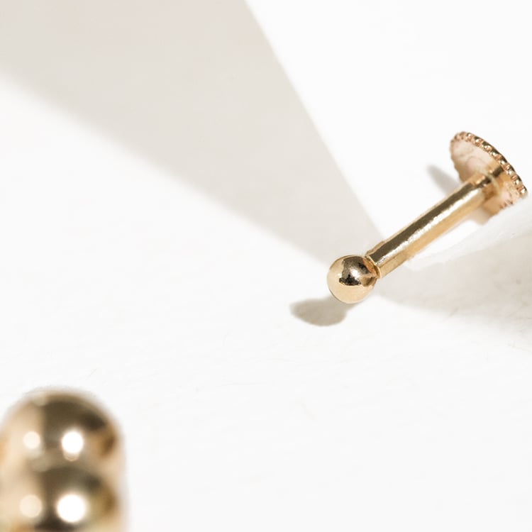 Zlatý labret piercing do ucha Izis 123123