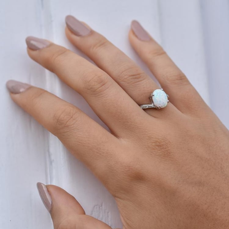 Zlatý prsten s opálem a diamanty 32644