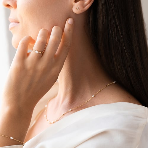 Elegantní zlatý prsten s perlou a diamanty Azana