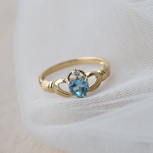 Zlatý claddagh prsten s topazem a diamantem Norie