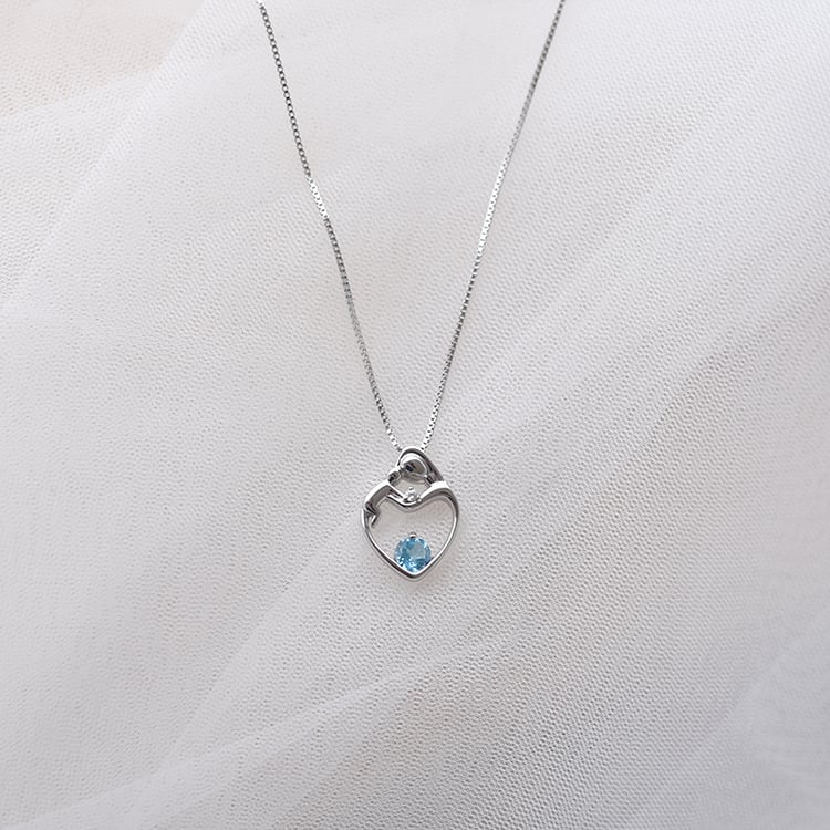 Přívěsek matka a dítě se švýcarským topazem a diamantem Ella 146329