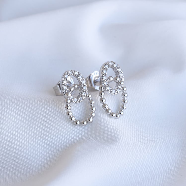 Proplétané náušnice z bílého zlata 85038