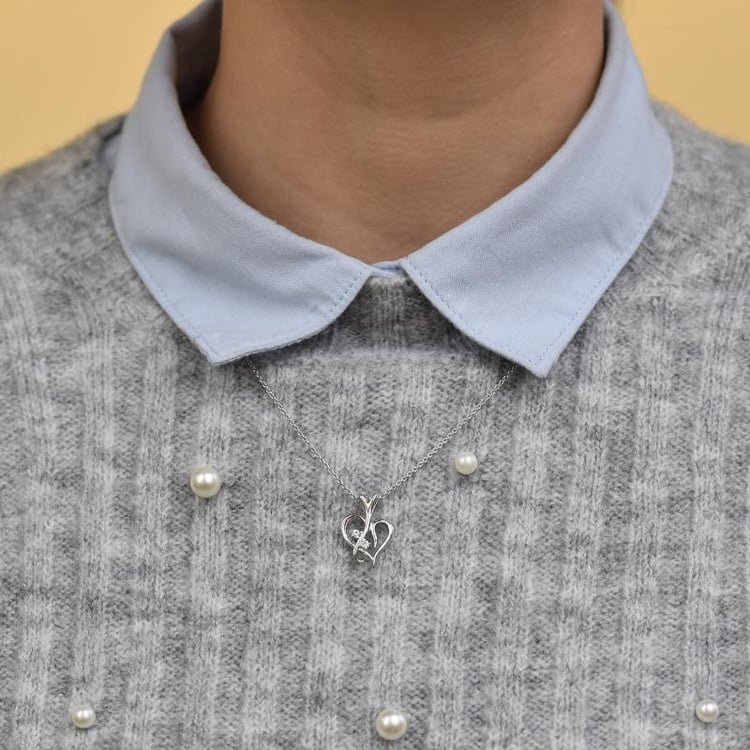 Stříbrný přívěsek ve tvaru srdce s diamanty Lynelle 103325