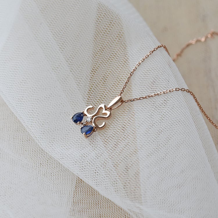 Zlatý náhrdelník se safírem a diamanty 69750