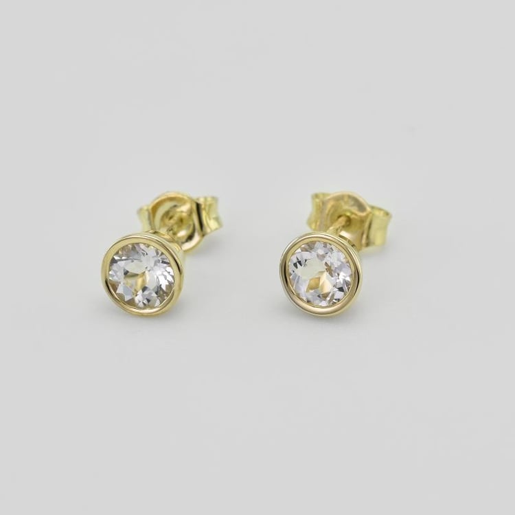 Stříbrné bezel náušnice s bílými topazy Wetty 102815