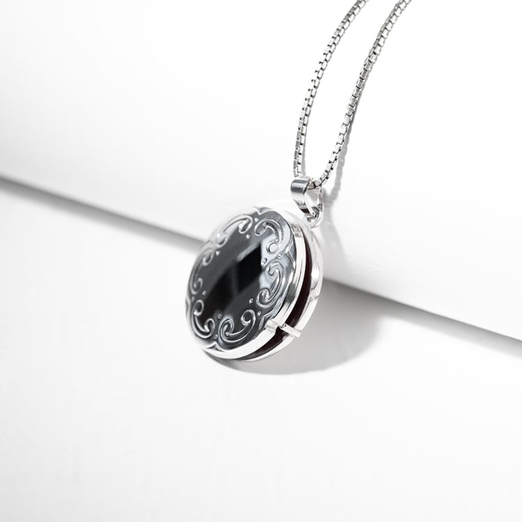 Stříbrný otevírací medailon 128638