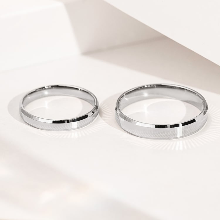 Zlaté snubní prsteny se zkosenými hranami a netradičním povrchem Roel 156800