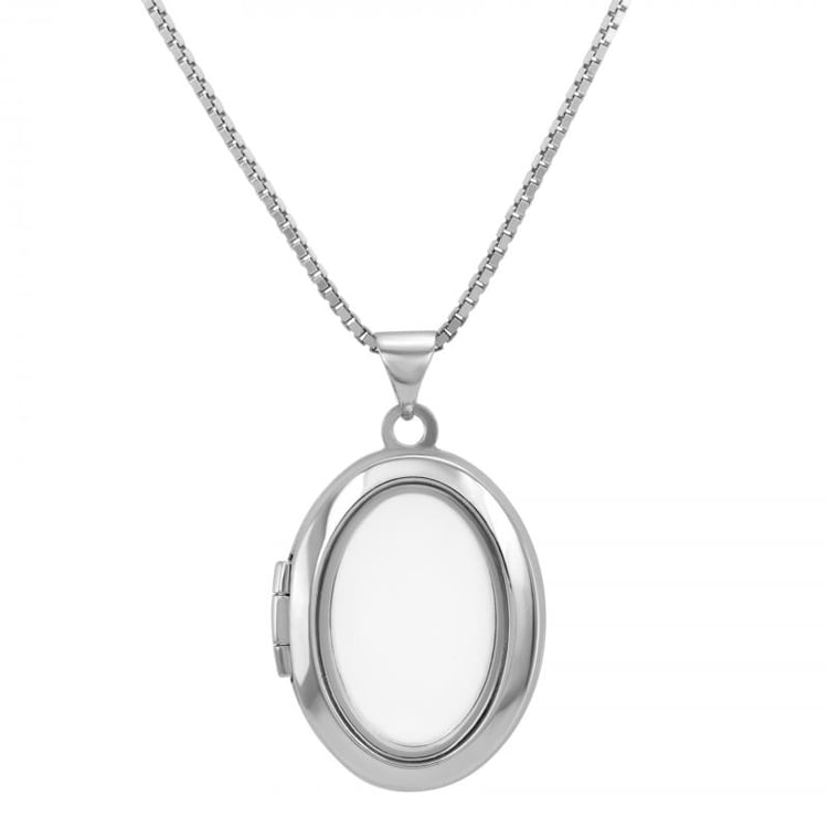 Stříbrný medailonek s průhledným vnitřkem