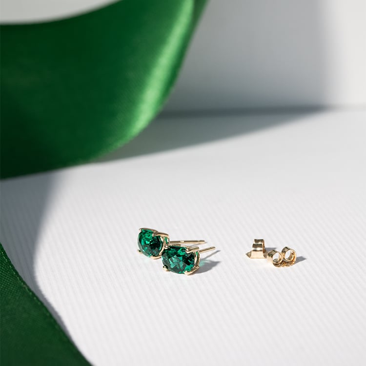 Zlaté náušnice s oválnými smaragdy Qati 121892