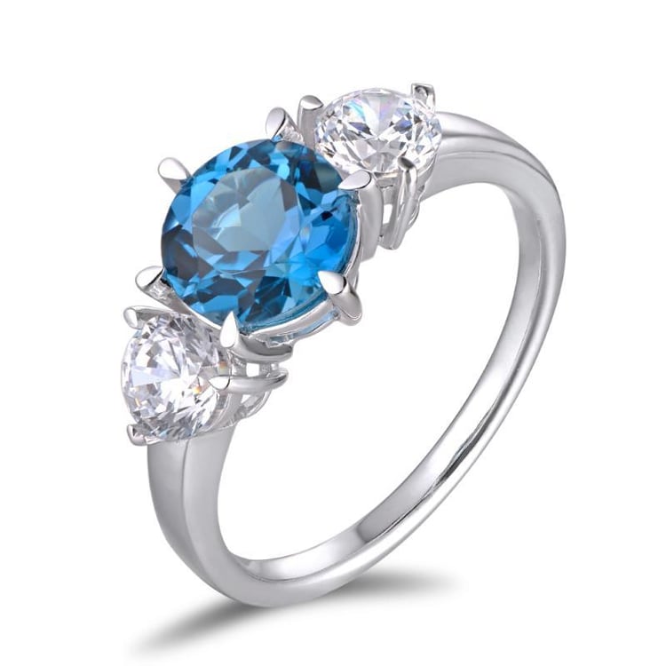 Zlatý prsten s oválným topazem a zirkony Dameq