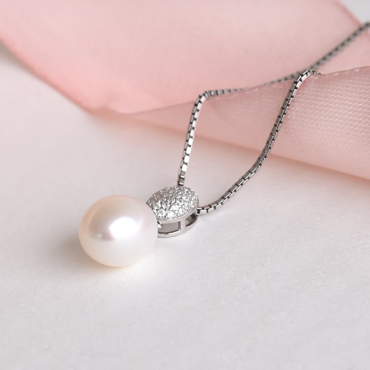 Stříbrný přívěsek s perlou a zirkony 78128