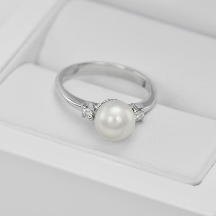 Prsten s perlou a diamanty 21136