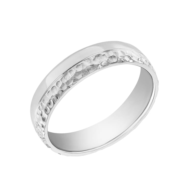 Dámský snubní prsten s tepaným povrchem 34679