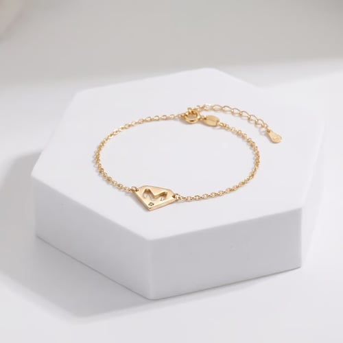 Zlatý náramek s diamantem a písmenem M Nola