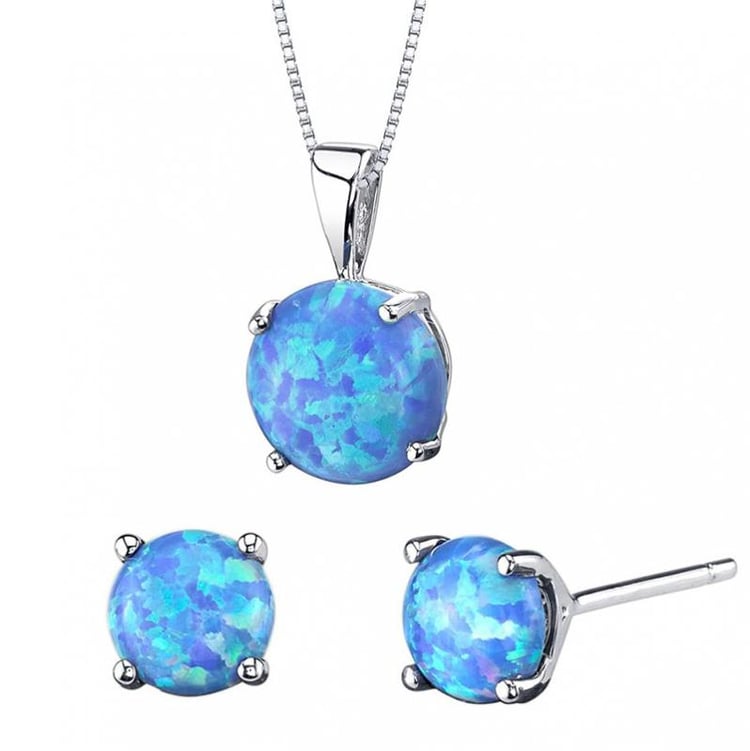 Zlatá kolekce šperků s modrými okrouhlými opály Tadeo