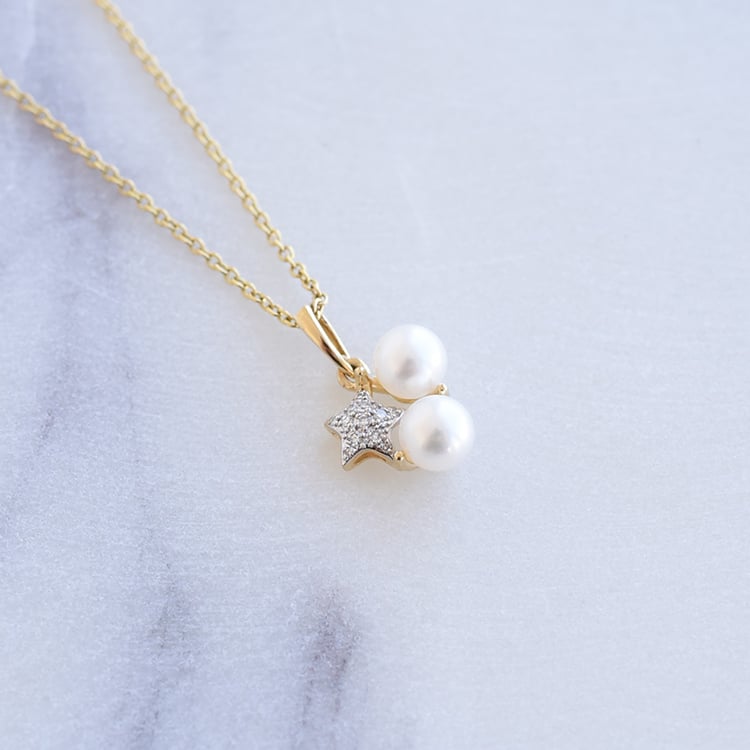 Zlatý perlový přívěsek s hvězdou plnou diamantů 87420