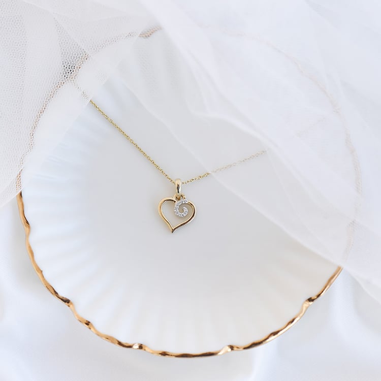 Přívěsek ve tvaru srdce s diamanty 93654