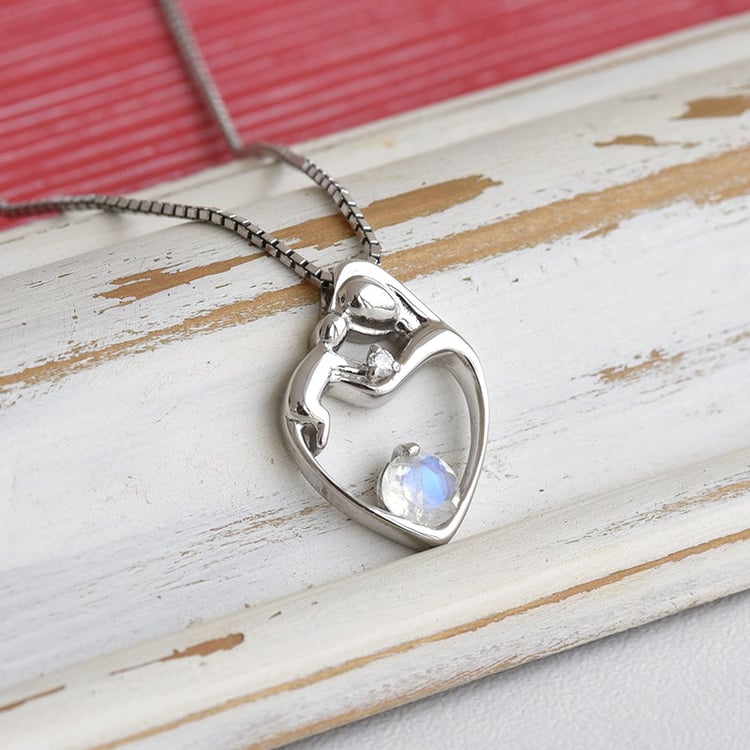 Stříbrný přívěsek matka a dítě s měsíčním kamenem a diamantem 84443