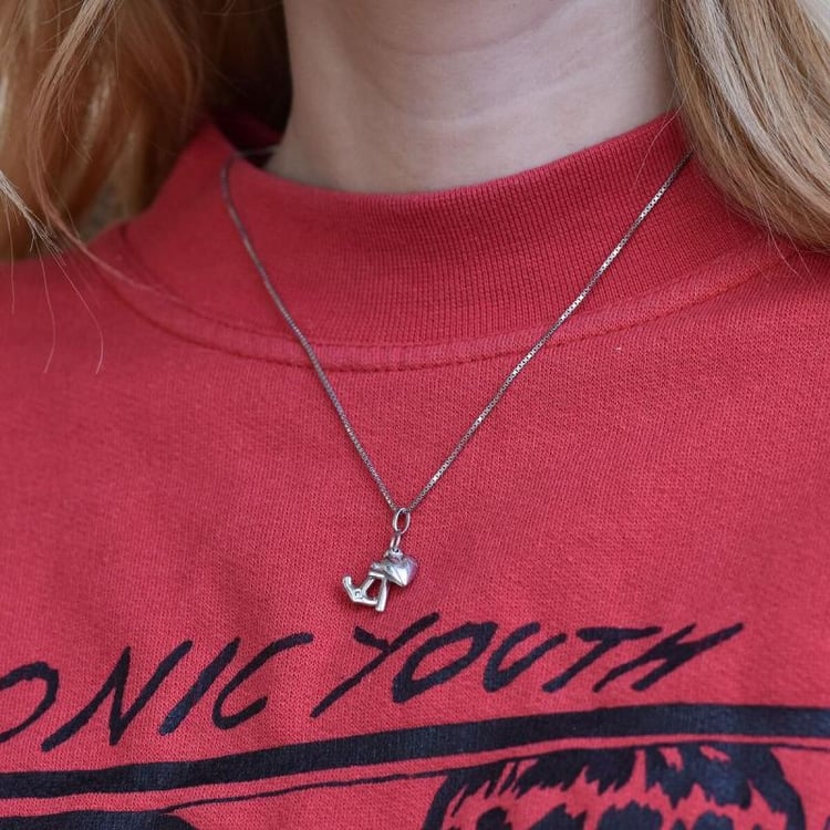 Přívěsek se symboly ze stříbra 28566