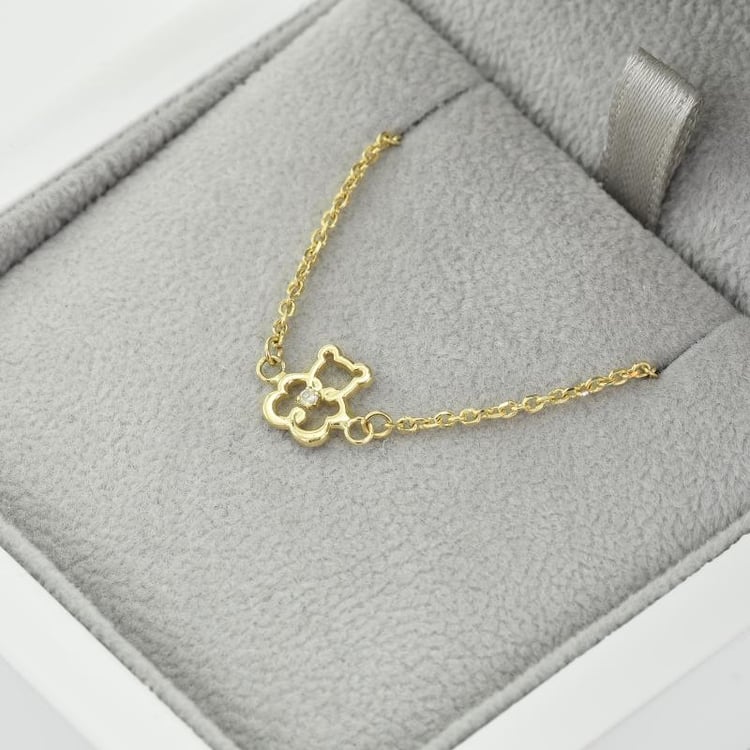 Zlatý dětský náramek s medvídkem 38772