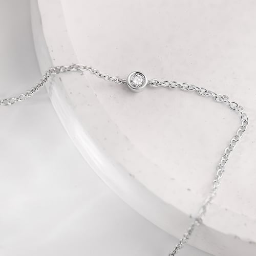 Zlatý minimalistický náramek s diamantem Bonato