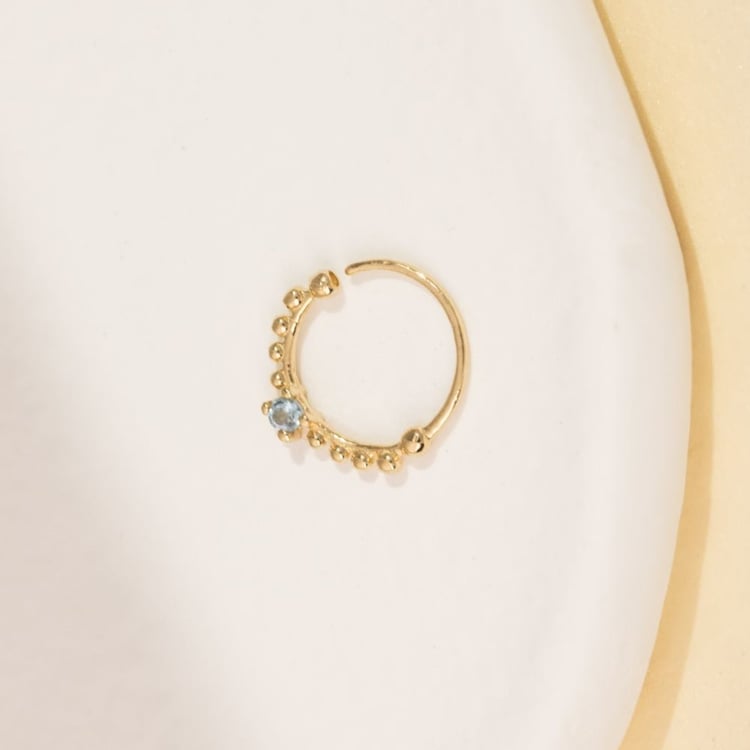 Zlatý septum piercing s akvamarínem Arla 164437