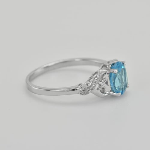 Zlatý prsten se švýcarským topazem a diamanty Alanyse