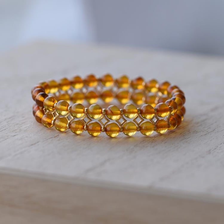 Stříbrný pozlacený náramek s koňakovými jantary Eliezer 52311