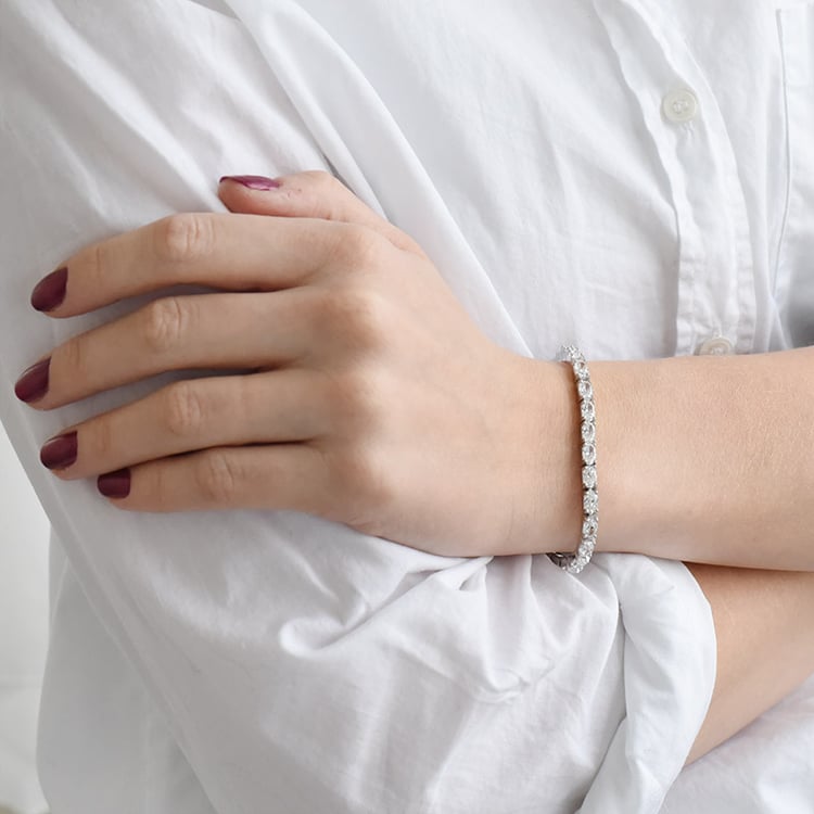 Stříbrný náramek s oválnými zirkony 90691