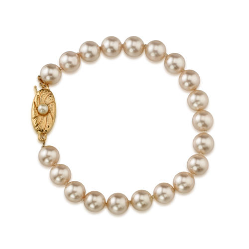 Náramek s oranžovými perlami