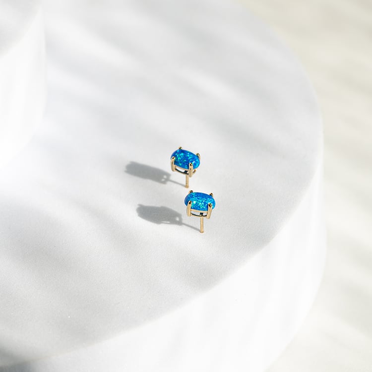 Modré oválné opály ve zlatých náušnicích Qati 145535