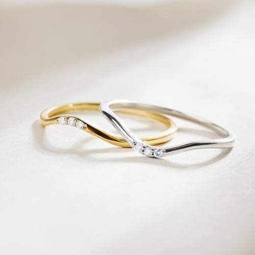 Stříbrný vykrojený prsten se třemi diamanty Cason