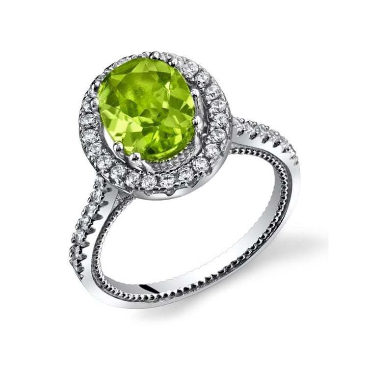 Stříbrný prsten s oválným olivínem a zirkony Sylex