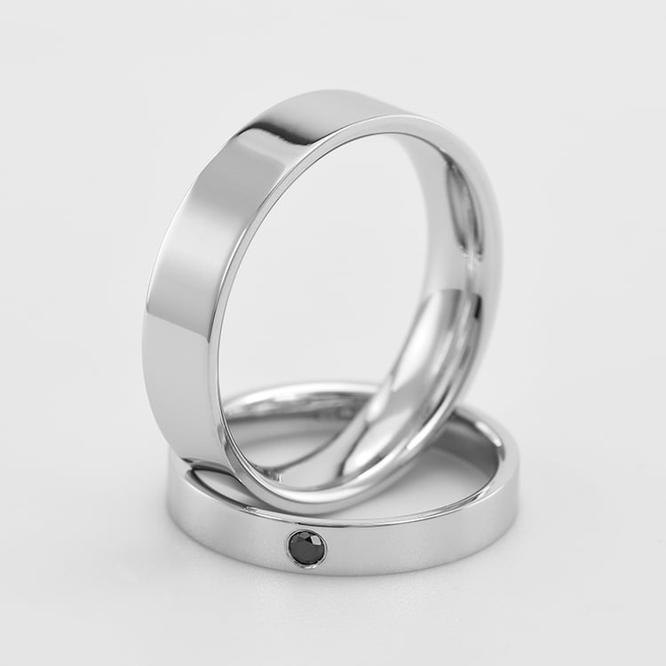 Platinové snubní prsteny s diamantem 58225