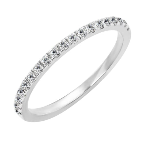 Platinový eternity prsten s diamanty a pánský půlkulatý snubní prsten Otila