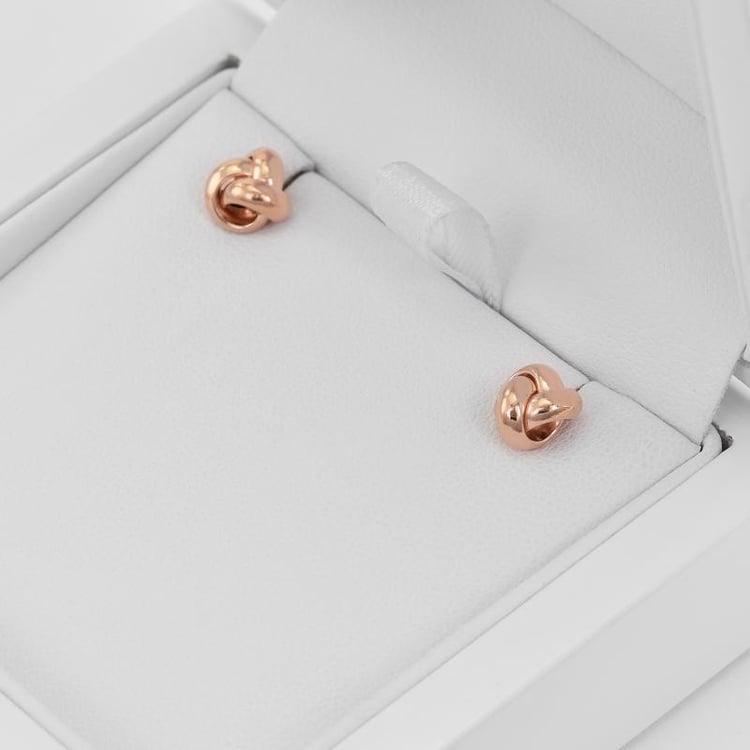 Zlaté napichovací náušnice ve tvaru uzlíků 37311