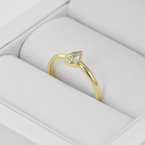 Zlatý zásnubní set prstenů s certifikovaným diamantem Ralyas